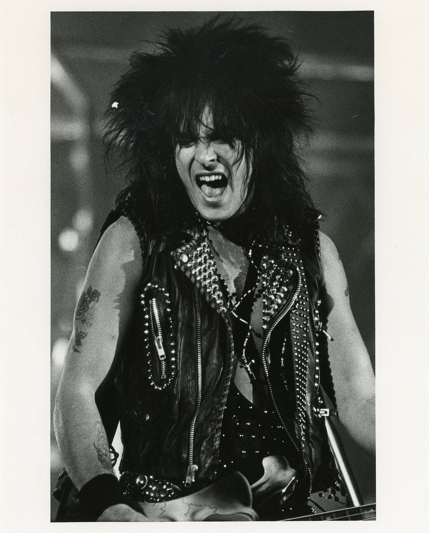 Solo shot of Nikki Sixx on the Girls Girls Girls Tour 1987-1988